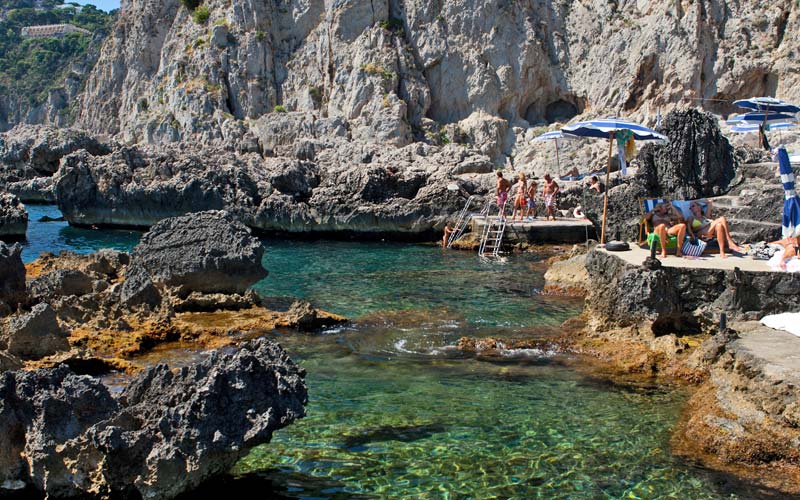 Fontelina Beach Club - Beach opposite the Faraglioni of Capri, Italy